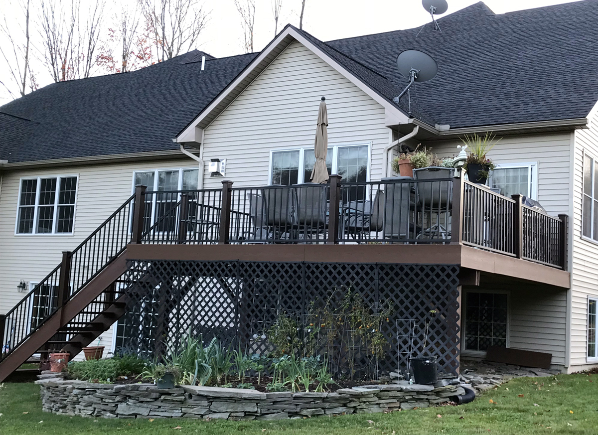Upgraded 14 X 20 deck constructed with low maintenance Trex composite decking materials.